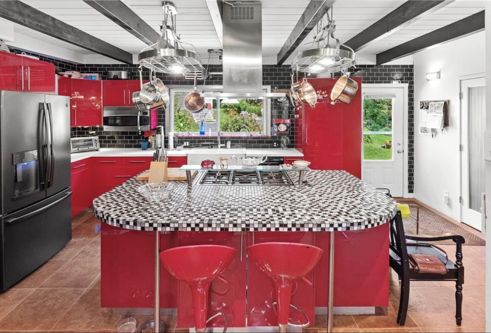 The Diner at The Ranch — kitchen with red cabinets and tiled island